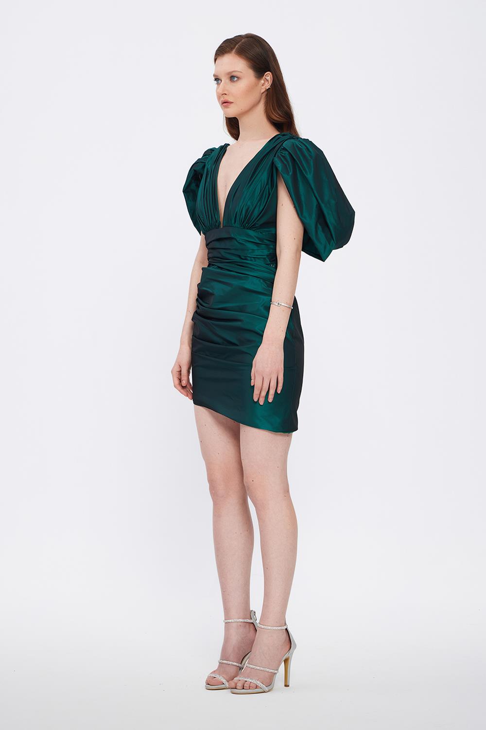 Evening Dress with Short Front and Long Sleeve Slits at the Back